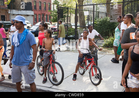 People and sights seen along the way of the Universal Hip Hop Parade in the Bedford Stuyvesant neighborhood of Brooklyn, NY Stock Photo