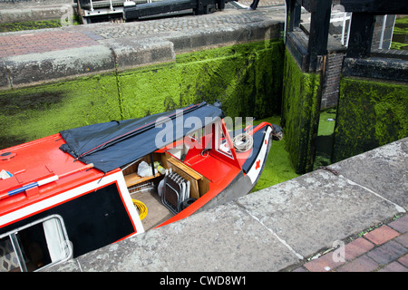 Barge going through Camden Lock in London UK Stock Photo