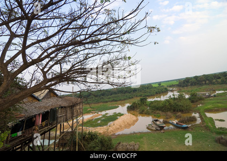 Horizontal typical view of the landscape around Tonle Sap Lake and the stilted houses of Kompong Khleang, the floating village, Stock Photo