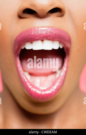 Cropped image of African American woman with mouth open Stock Photo
