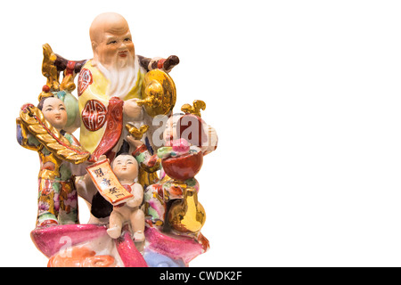 Longevity God Antique Porcelain Figurine with Three Prosperity Children Isolated on White Background Stock Photo