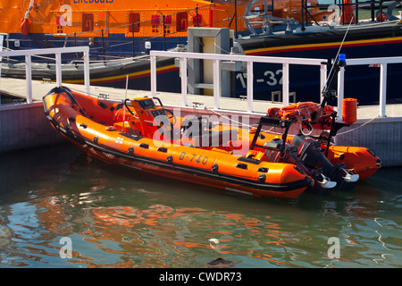 Weymouth outer harbour RNLI  boats Stock Photo