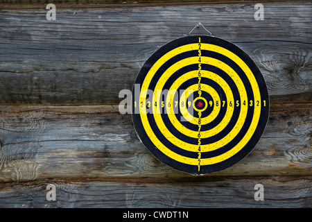 Crossaired target is with holes hanging on wall Stock Photo