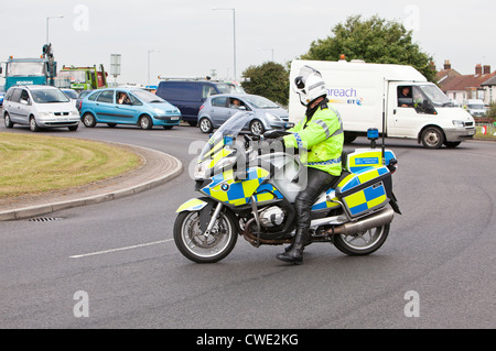 Metropolitan Police motorcycle outriders in Great Yarmouth during the London 2012 Olympic Torch Relay Stock Photo