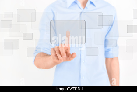 Man touching blank virtual screen. Isolated on white. Stock Photo