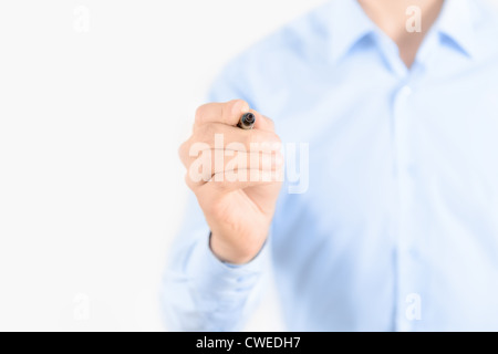 Young businessman prepare to start drawing concept. Isolated on white. Stock Photo
