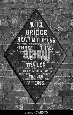 Old cast iron weight restriction sign from canal bridge, Foxton Locks, Market Harborough, Leicestershire, England, UK Stock Photo