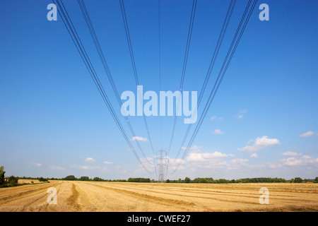 Electricity pylon and lines in countryside Stock Photo