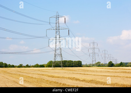 Electricity pylons in countryside Stock Photo