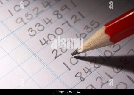 Handwritten numbers in ledger Stock Photo