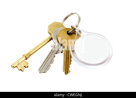 used keys on key ring with blank circular key tab for own copy or logo Stock Photo