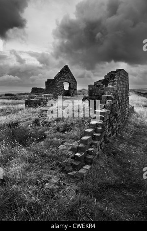 Red brick ruins of an old quarry near Porthgain, Pembrokeshire. Wales. Stock Photo