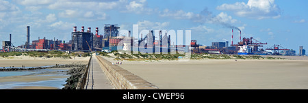 View over heavy industry seen from the beach at Dunkirk / Dunkerque, Nord-Pas-de-Calais, France Stock Photo