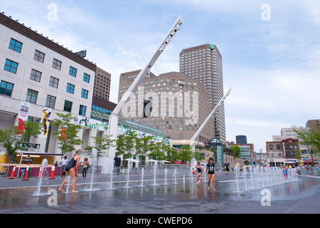 Children playing in the fountain at  Place des festivals in downtown Montreal, province of Quebec, Canada. Stock Photo