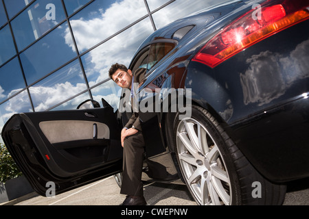 young man at a modern car Stock Photo