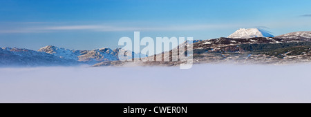 Panoramic view of Ben Lomond above a mist covered Loch Lomond. From the summit of the Conic, near Balmaha, Drymen, Scotland, UK. Stock Photo
