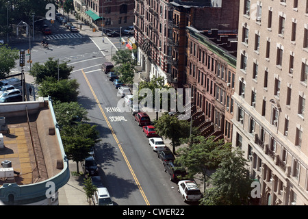 Street scene in Washington Heights neighborhood of New York, NY, USA