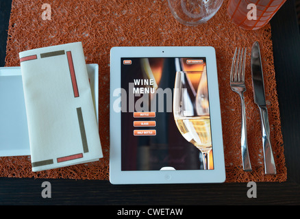 A restaurant menu on iPADs.  The page selected is the homepage for the wine menu. Stock Photo