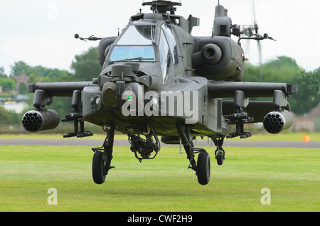 COSFORD, SHROPSHIRE, ENGLAND - JUNE 17: Boeing AH-64 Apache attack helicopter taking off for display Stock Photo