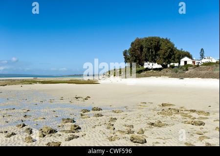 Beach and houses in Curchhaven, an old village in Westcoast National Park, South Africa Stock Photo