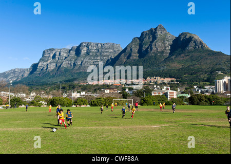 Youth football match youth league at Rygersdal - Table mountain in the background - Cape Town South Africa Stock Photo