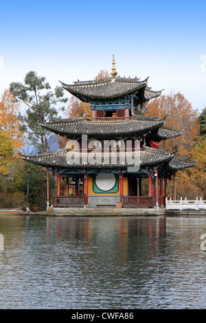 A Chinese pagoda in the lake of Black Dragon Pool in Lijiang, Yunnan Province of China. Stock Photo