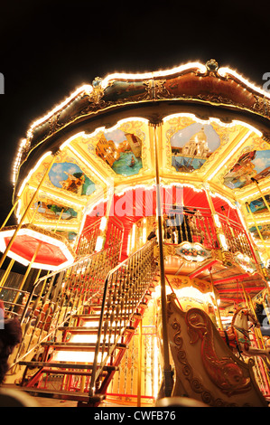 Copenhagen, Denmark - 18 Dec, 2011: Night view of carousel in Tivoli Gardens Stock Photo