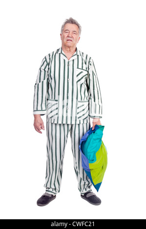 Senior man in pajamas isolated in white Stock Photo