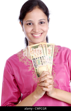 Woman holding Indian currency notes Stock Photo