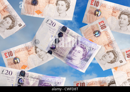 Pound sterling money notes falling from the sky Stock Photo