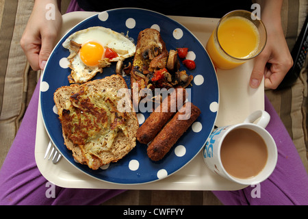 A tasty breakfast being prepared in Brighton, East Sussex, UK. Stock Photo