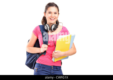 A female student with headphones isolated on white background Stock Photo