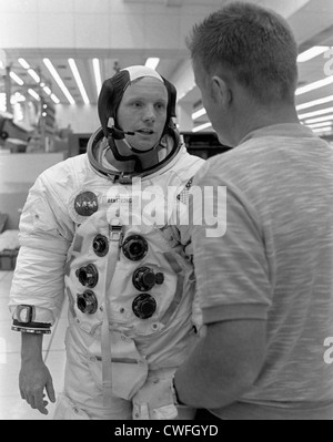 NASA Astronaut Neil Armstrong talks with astronaut Don Lind in July 10, 1969 at the Kennedy Space Center flight crew training building. Stock Photo