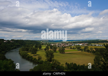 Scenic view over the River Neckar Valley and Offenau in South Germany on an overcast day with huge cloud formations Stock Photo