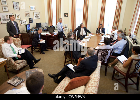 President Barack Obama meets with senior advisors in Chief of Staff Rahm Emanuel's West Wing office at the White House, June 15, Stock Photo