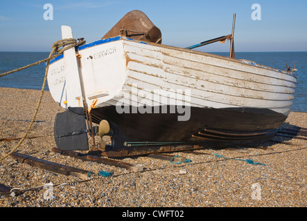 Small fishing boat Dunwich beach Suffolk England Stock Photo