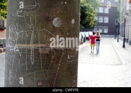 Drawing graffiti on a Pillar Stock Photo