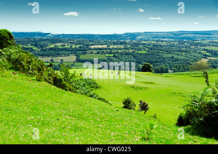 Golfers on the green at Bradnor hill golf course Kington Herefordshire UK Stock Photo