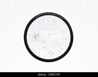 A cracked photographic filter, on a white background Stock Photo