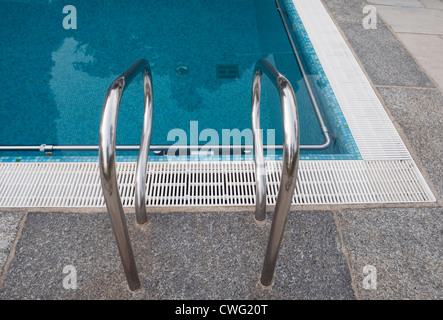Swimming pool ladder Stock Photo