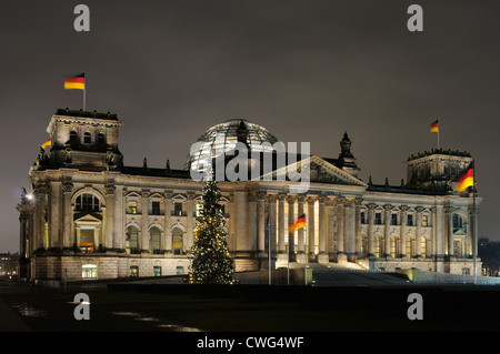 Reichstag parliament building at Christmas season with Christmas tree and German flag, Berlin, Germany, Europe Stock Photo