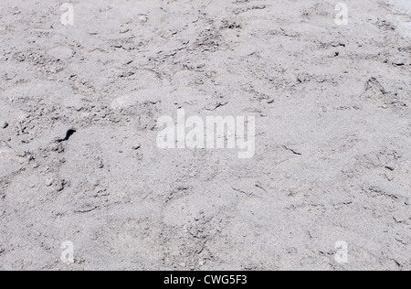 Abstract background of textured grey or gray sand on beach. Stock Photo