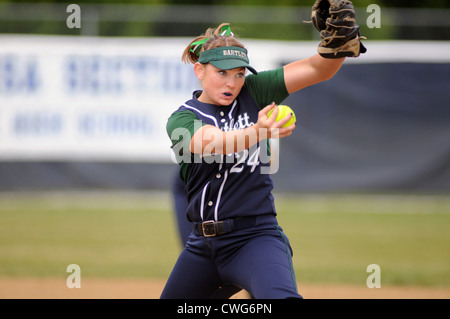 Softball Pitcher during a high school playoff game. USA. Stock Photo