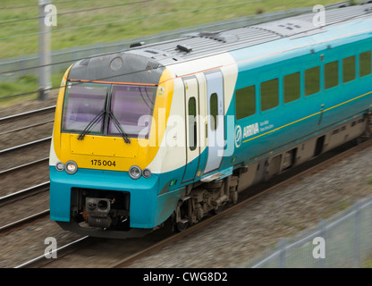 Class 175 diesel-electric multiple unit train operated by Arriva Trains Wales heading north on the WCML, north of Warrington. Stock Photo