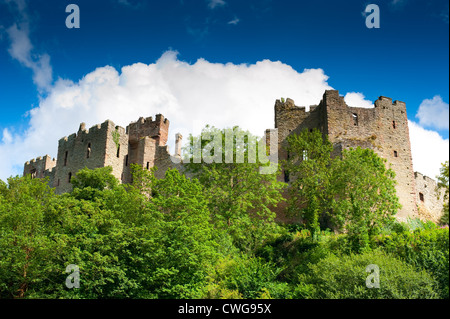 Ludlow castle against a blue sky and clouds Stock Photo