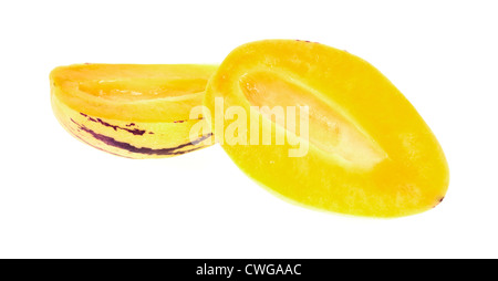 Two halves of pepino melon on white background Stock Photo
