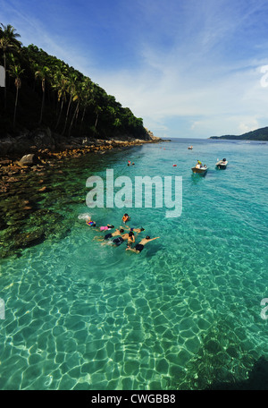 Malaysia, Perhentian Islands, Perhentian Kecil, tourist snorkling in turquoise water Stock Photo