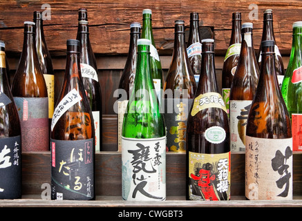 Sake bottles outside of restaurant, Tokyo, Japan Stock Photo