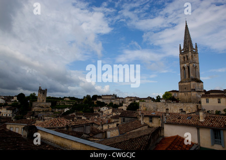 The Saint Emilion Monolithic Church, bell tower and villiage in Saint Emilion, Southern France Stock Photo