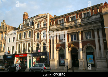 Historic buildings lining High Street, Colchester, Essex, England Stock Photo